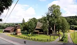 Church, bell tower and old organist's house in Gosprzydowa