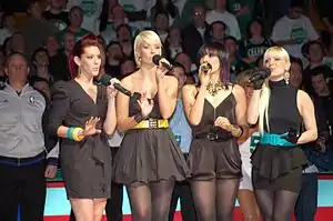 Jada singing the national anthem at a Boston Celtics game. From left to right: April Forrest, Elle Wine, Jacyn Tremblay and Lauren O'Keefe