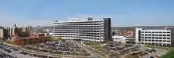 View of James J. Peters VA Medical Center main building on left, research building on right.