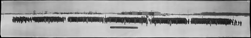 Black and white people of people standing in snow