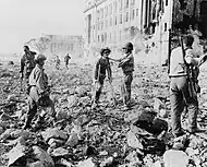 Japanese Imperial forces wounded surrender to US and Filipino soldiers under the United States Army and Philippine Commonwealth Army in unidentified city in Manila, May 1945.