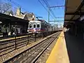 A Center City-bound train on the West Trenton Line stops at Jenkintown–Wyncote station in November 2017