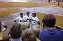 Bullpen coach Joe Pignatano, third base coach Eddie Yost, and first base coach Yogi Berra in  September 1969.