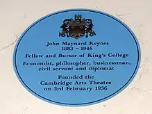 John Maynard Keynes plaque at Cambridge Arts Theatre coining him a economist, philosopher, businessman and civil servant