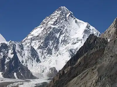 K2 is located on the China–Pakistan border between Baltistan in the Gilgit-Baltistan region of northern Pakistan, and Dafdar Township in Taxkorgan Tajik Autonomous County of Xinjiang, China.  Its height is 28251 ft, above sea level, which makes it the second highest peak of the world after Mount Everest at 29029 ft.