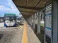 Feeder buses at the bus stop next to the station