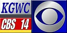 In the upper left, blue italicized K G W C lettering in a serif on a silver box with a gray underline. In the lower left, white italicized C B S 14 lettering in a sans serif on a red box with a yellow underline. To the right, in a blue box, the CBS eye in silver.