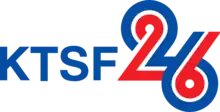 Blue letters K T S F next to a red-white-blue striped stylized numeral 26, with the bottom right of the 2 connecting into the 6