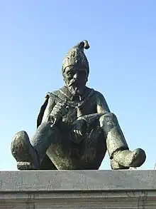 King Kyrié, King of the kabouters, sits in the central square of Hoogeloon