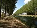 This canal runs adjacent to the northeast boundary of Philippine