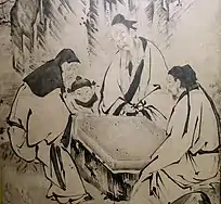 A screen painting depicting people playing Go, by Kanō Eitoku (1543–1590), Japanese