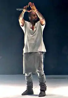 Kanye West performing in 2013