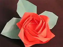 Kawasaki rose using the twist fold devised by Toshikazu Kawasaki. The calyx is made separately.