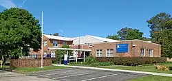 Two-storey building constructed in red bricks