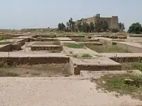 Remnant of the Apadana at Susa built by Darius I. Only the foundations remain, but there was once a large hall of columns located on this structure.