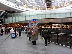 The Airport Center at-grade level, one level above the station's offices and ticketing machines, and two levels above the tracks