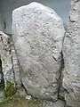 Leftmost of three central stones, Knockmany Chambered Tomb, Co. Tyrone