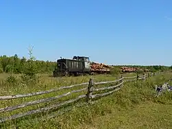 Locomotive TU7-2072 with freight train