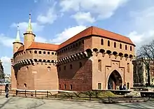 Gate to the former fortified passage facing St. Florian's Gate to the south