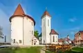 Pungert - Old Defense tower with St. Roch's Church