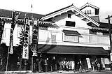 Front door of the arena, nobori flags on the left