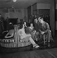 During intermission at one of the bi-weekly "open house" dances held in the main lounge of Idaho Hall, Arlington Farms.