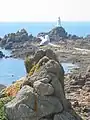 The causeway to the lighthouse is uncovered at low tide