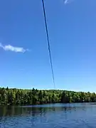 A power line crossing the western basin of the lake