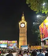 Kolkata Time Zone Tower in 2023, lit up at night during Durga Puja