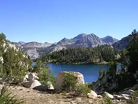 Lake of the Lone Indian and surrounding mountains.