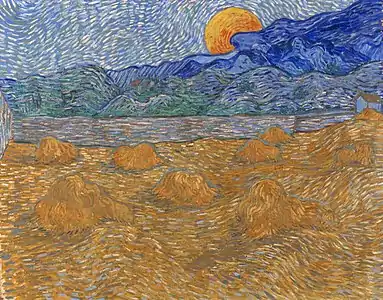  A squarish painting of a darkened wheatfield of stacks, with a river and mountains in the background under a rising full moon.