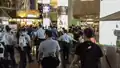 Police disperse visitors to shopping malls in the Langham Place to leave