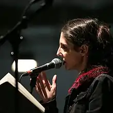 Gauthier reading at The Lieu Unique in Nantes in 2019