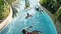 Children in the lazy river at Harborside Pool Club at The Boca Raton