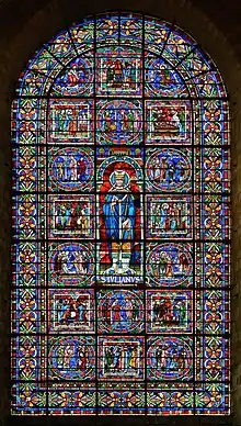 Stained glass depicting Julian of Le Mans, and 16 episodes of his life.