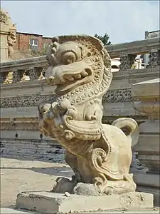 Statue of lion, door guardian, in Khmer style