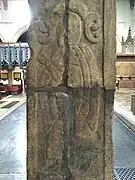 Leeds Cross panel Cii (south face, second from bottom), depicting a holy figure. The top-right quarter is a modern reconstruction.