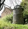 Large ventilation shaft of Glenfield Tunnel built by the Leicester and Swannington Railway, by the side of New Parks Way, Leicester, in April 2023.