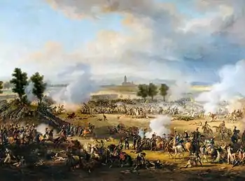 Painting depicts the crisis of the Battle of Marengo. French infantry sweep forward in long straight lines from left to right as French cannons fire in the foreground. Their target, the white-coated Austrian foot soldiers, are in disorder in the center of the frame.