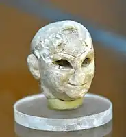 Head of a Sumerian male worshipper from Tell Asmar (Eshnunna), Iraq, on display at the Sulaymaniyah Museum, Iraq since 1961. The Lost Treasures from Iraq designates it as "status unknown".