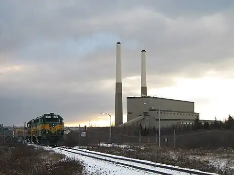 The twin smoke stacks at Lingan Generating Station.