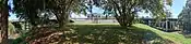 View from Two Bridges Park in Lismore, New South Wales, December 2023 - panorama showing Colemans and Fawcett Bridges, with Winsome Hotel between