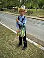 Mennonite peddler boy selling bread in Bacalar, Quintana Roo.