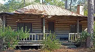 Log cabin with the still