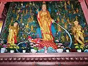 Statues of Longnü (left), Guanyin (middle) and Sudhana (right) at the Mahavira Hall.