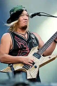 Takasaki performing with Loudness at Wacken Open Air in 2016