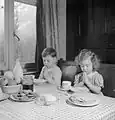 Luxembourgish children (evacuees) in Surrey, England (1942), saying grace before a meal