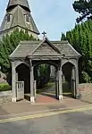 Lychgate to south west of Parish Church of St Mary the Virgin