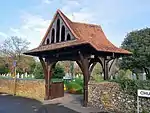 Lychgate to west of Parish Church of St Paulinus