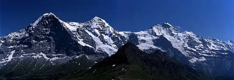 Image 39The Eiger (shown along with the Mönch and the Jungfrau) has the tallest north face in the Alps. (from Alps)